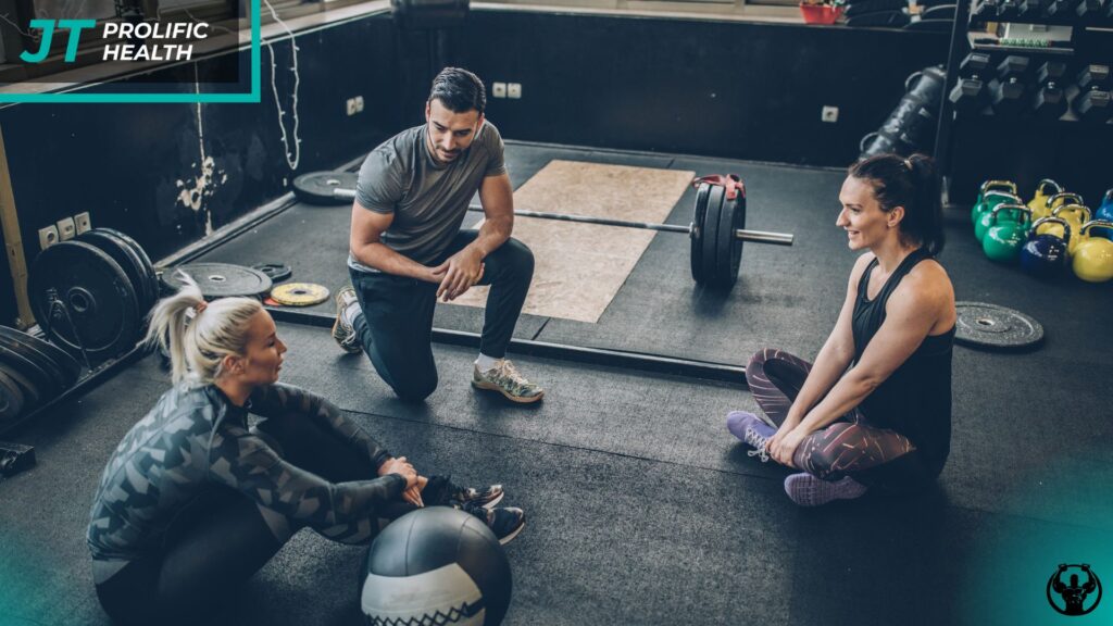Prolific Health personal trainer guiding beginner at local gym.